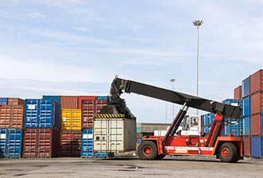 forklift lifting shipping containers